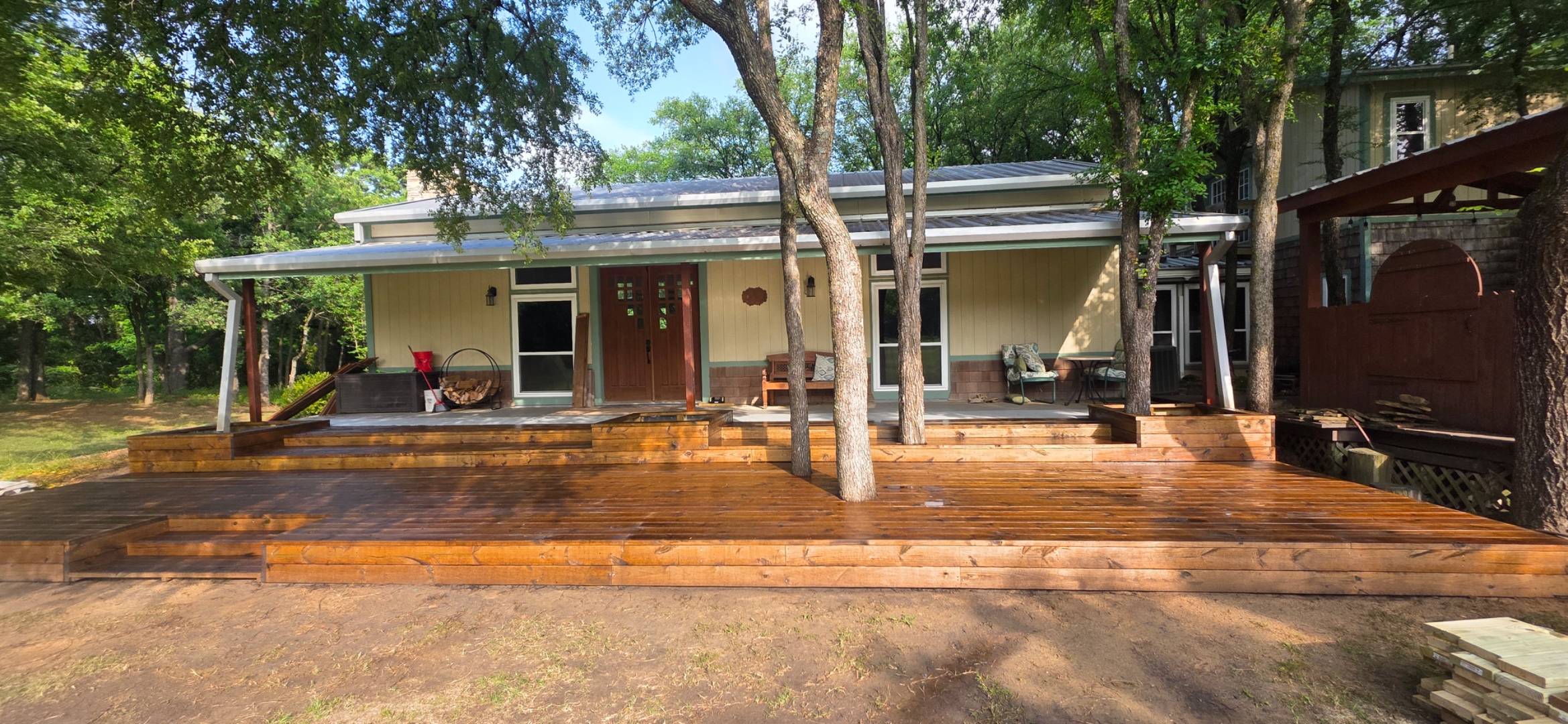 Finished stained deck — angled close-up showing wood grain