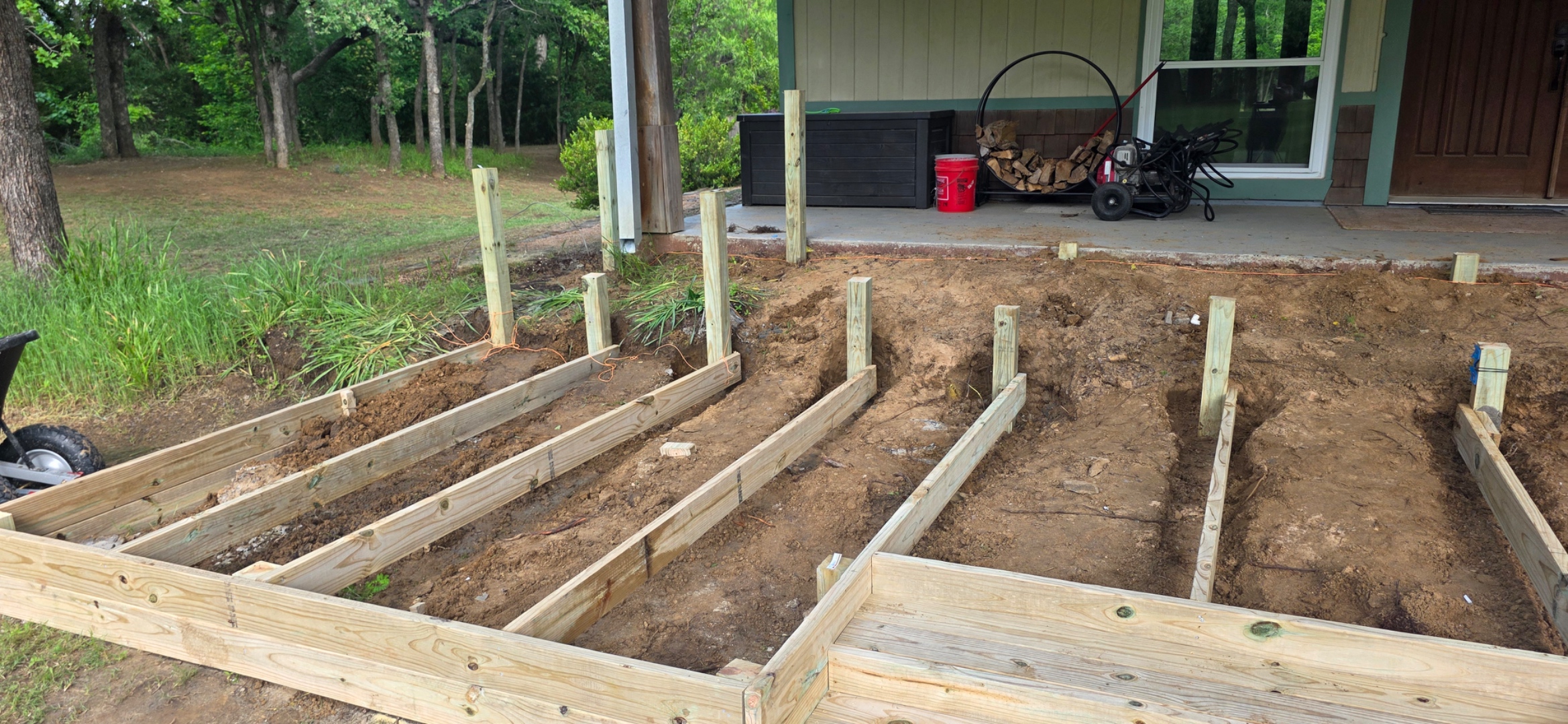 Deck construction start — framing and foundation stage